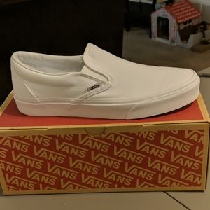 All white slip on vans